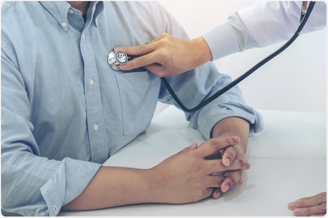 Doctor listening to the heartbeat of a patient with COPD.