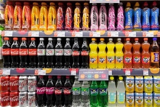 Sugar-sweetened beverage, artificially sweetened beverage and sugar intake  and colorectal cancer survival